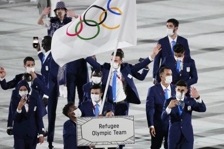 东奥开幕式上的难民奥林匹克代表队。Global

