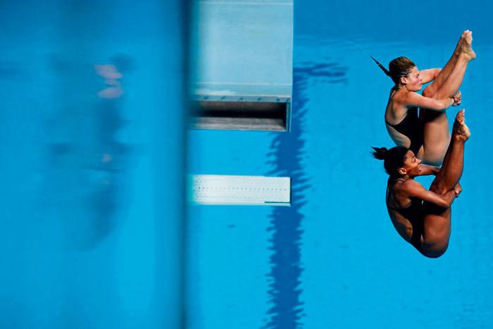 加拿大女子跳水選手阿貝爾(下)和西特里尼布利沃，周五摘下3米彈板銀牌。星報