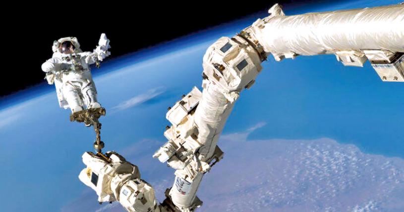 ■太空人和加拿大臂。网上图片