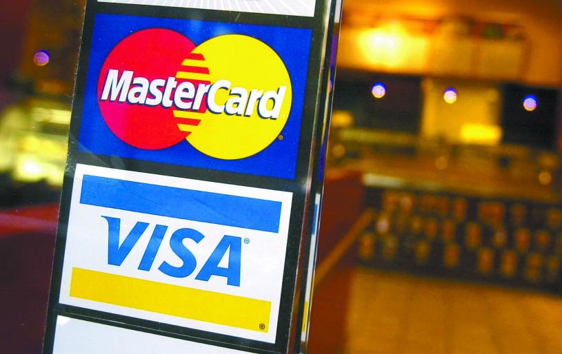 萬事達和Visa等4家公司宣布退出Libra加密貨幣項目。圖為在紐約咖啡店的入口處，萬事達和Visa信用卡的徽標。美聯社
