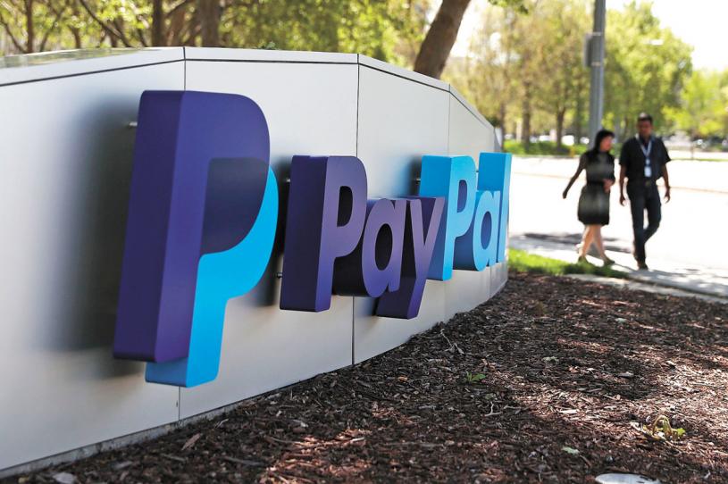 封锁禁足政策，让PayPal等线上支付公司业务量暴增。资料图片