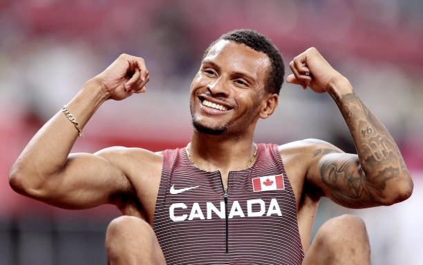 TOKYO, JAPAN - AUGUST 03:  Andre De Grasse of Team Canada reacts after finishing first in the Men's 200m Semi Final on day eleven of the Tokyo 2020 Olympic Games at Olympic Stadium on August 03, 2021 in Tokyo, Japan. (Photo by Michael Steele/Getty Images)