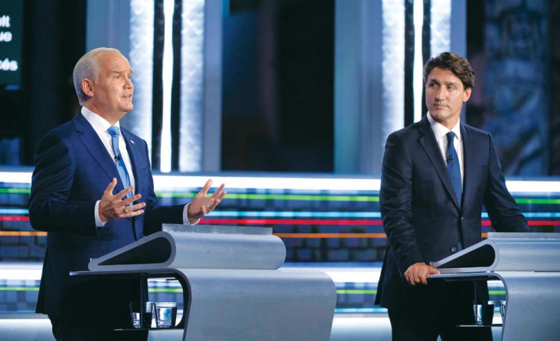 ■奧圖爾(左)領導的保守黨，和杜魯多的自由黨受選民支持度不相伯仲。圖為兩人日前在法語辯論上交鋒。加通社資料圖片