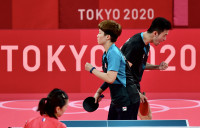 【东京奥运】对手“触网”发球抢最后一分 争议声中落败黄镇廷感遗憾