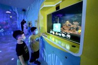 科技生活| 台湾AI水族馆设感应3D相机  眼球追踪鱼类资讯即现眼前