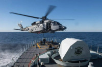 加军直升机西沙群岛两遭中国歼11战机危险拦截  产生气流致被迫改变航道