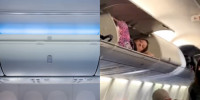 【有片】嫌飞机座位太小  有乘客爬上行李舱休息