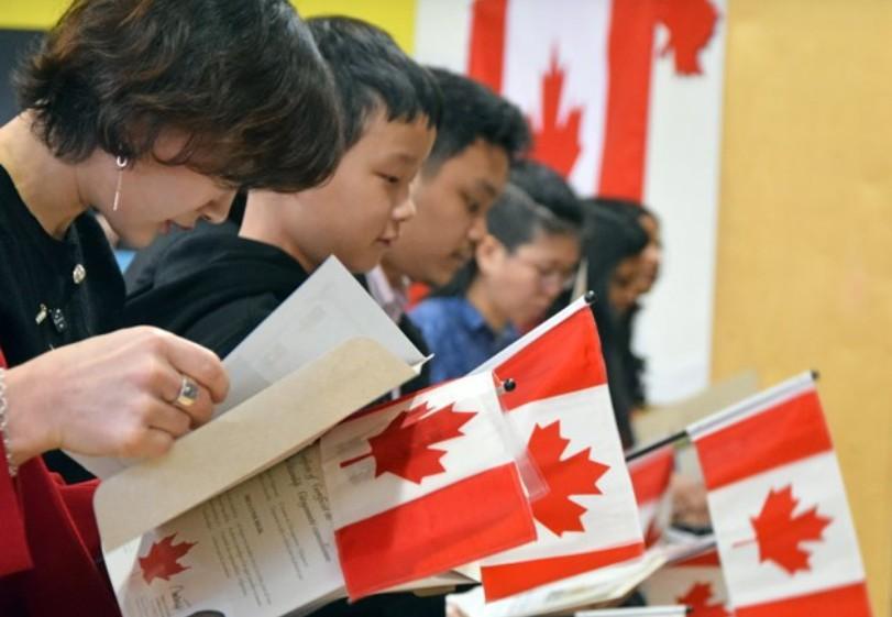一调查称6900万中国大陆和香港成人考虑移民加拿大。资料图片