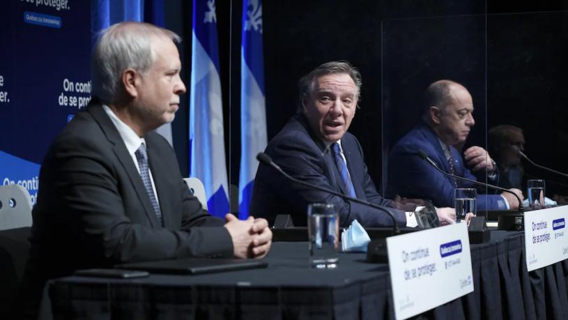 魁省省長勒格周二與新任省首席衛生官布瓦洛一同出席發布會，公布將開徵「衛生捐獻稅」。 加通社