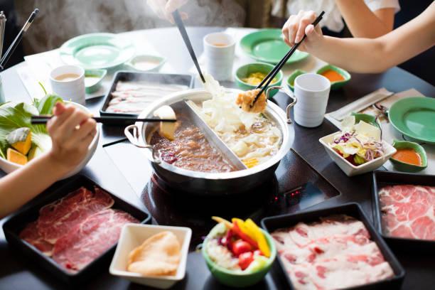 chinese foods Double flavor hot pot on the table