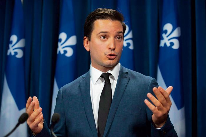 ■魁省移民厅长巴莱特周二向省议会提交削减移民的详细计划。加通社