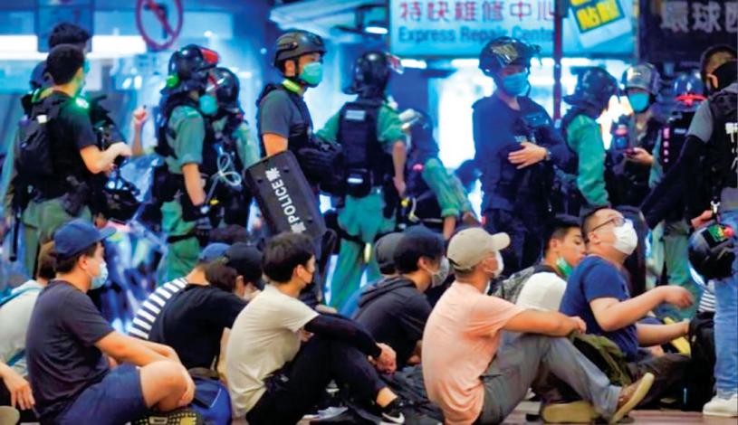 香港實施新的《國家安全法》，聯邦政府稱將給予港人支援。美聯社