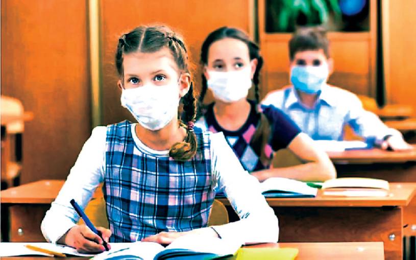 ■有家长担忧新学期不强制学生戴口罩会导致疫情恶化。资料图片