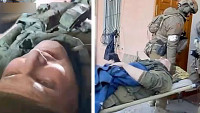 俄乌局势｜俄军官担架抬入院影片流传 乌记者指遭俄士兵驾坦克辗毙