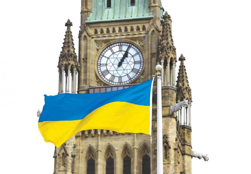 ■泽连斯基在国会发表讲话同一天，国会山庄挂起乌克兰国旗。  加通社