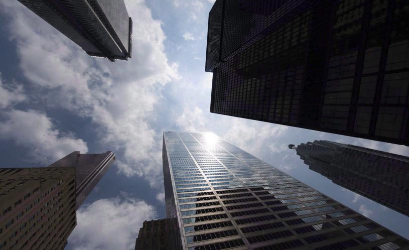 Bank towers are shown from Bay Street in Toronto's financial district on Wednesday, June 16, 2010. THE CANADIAN PRESS/Adrien Veczan