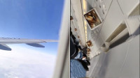飞机遇到强气流剧烈颠簸下坠 乘客惊恐尖叫拍片录下遗言