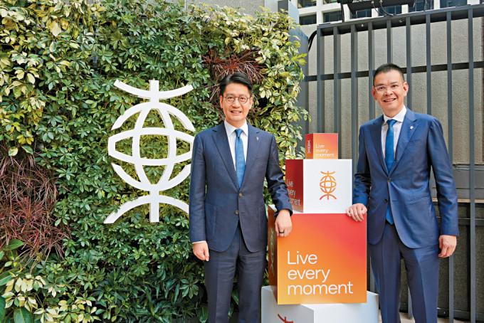 李民橋（右）、李民斌（左）兩兄弟自2019年接任父親李國寶掌管該行，聯合擔任東亞行政總裁。
