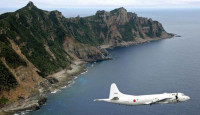 日媒指中国海警警告自卫队飞机离钓岛  日方:做法不可接受