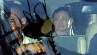 他信假释返曼谷住所惹争议 前进党质疑获特殊待遇