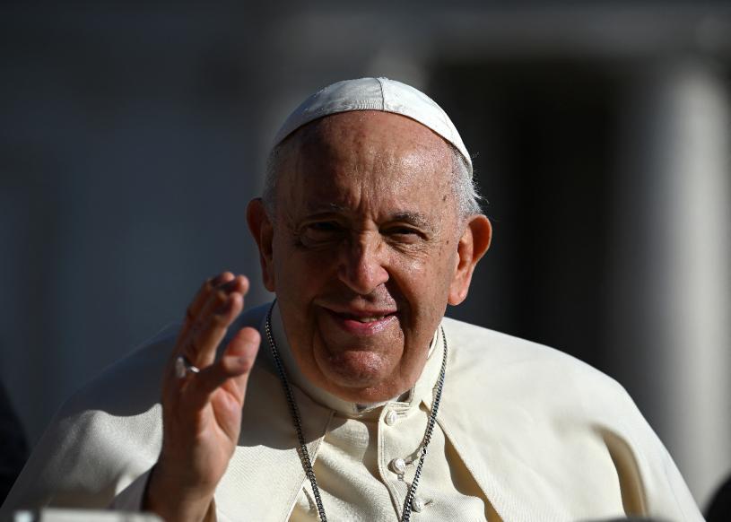 Pope Francis waves to pilgrims during his weekly general audience in St. Peter's Square at the Vatican on September 6, 2023. (Photo by Filippo MONTEFORTE / AFP)